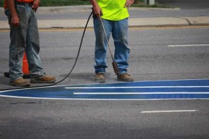 Blythe Construction is out on Catawba Avenue painting direction signs on the pavement as the DDI gets closer and closer to completion.