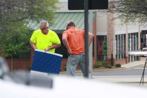 Blythe Construction is out on Catawba Avenue painting direction signs on the pavement as the DDI gets closer and closer to completion.