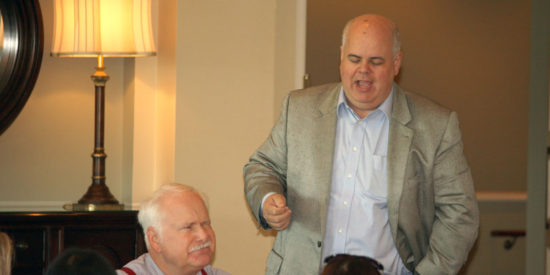 NCDOT's Warren Cooksey responds to a question while Commissioner Puckett listens