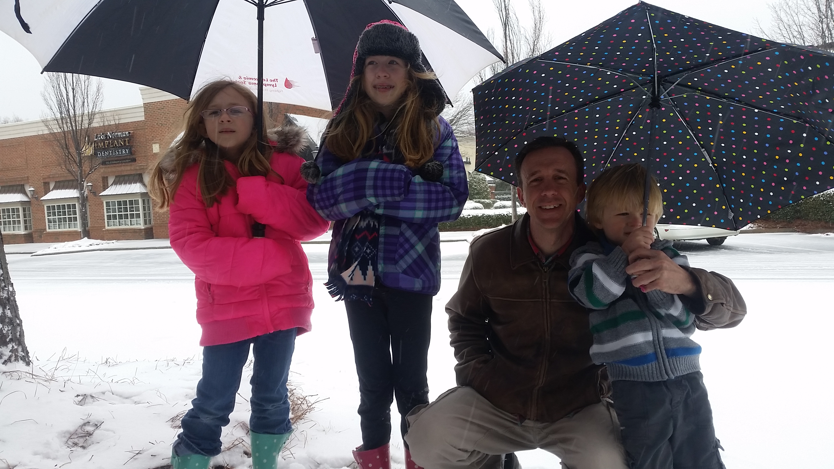 Isabelle, 7, Madelyn, 11, Wyatt,3, with dad, Casey Ashley in Jetton Village