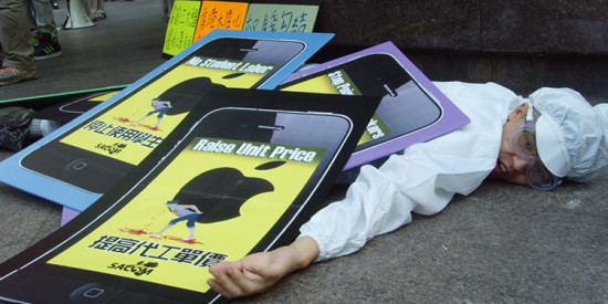 A Chinese protestor shows what he thinks of Apple's treatment of workers assembling iPhones. Credit: SACOM Hong Kong, FlickrCC.