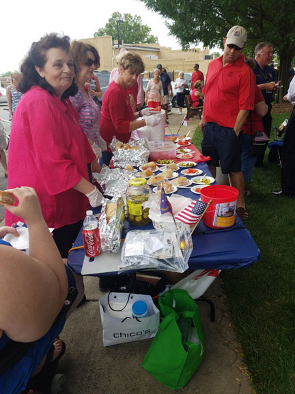 Erica Boss and the N. Mecklenburg Republican Women served food