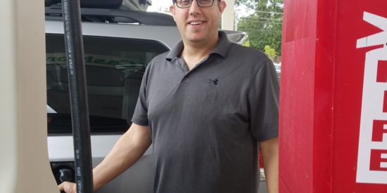 Joel Jaffe pumps gas at the Cashion's on Sam Furr