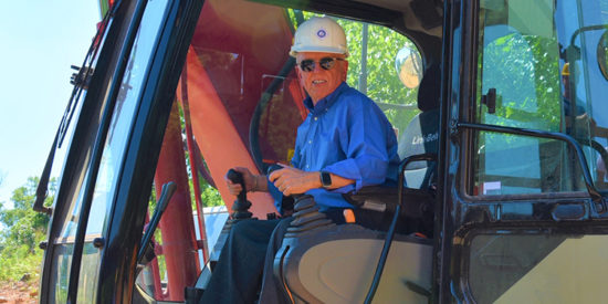 Washam, in strictly ceremonial capacity, lays last piece of boardwalk on Antiquity Greenway
