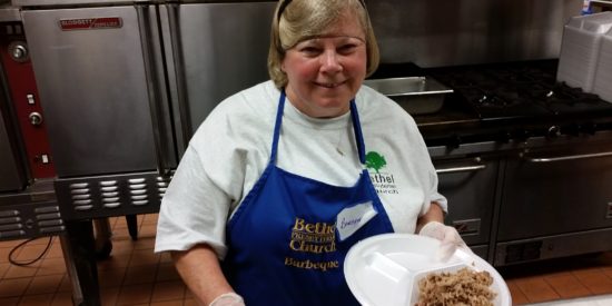 Barbara Dresser serving bbq