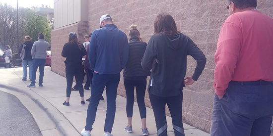 LINE OUTSIDE AN ABC STORE