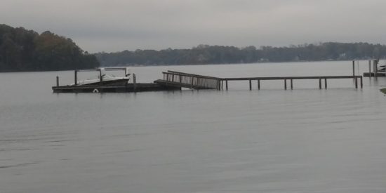 Dock ramp in center of photo tilts up because of high water. Picture taken on Belle Isle Drive