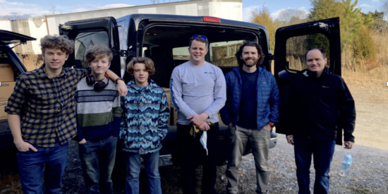 Ada Jenkins delivery (left to right): Elijah, Andrew, Peter, and Mike Knorpp; Bishop Nick Stowell (middle), and Glen Sanders