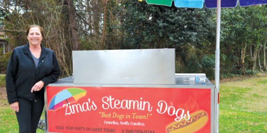 Mary Zima: The owner of Zima’s Steamin’ Dogs provides a unique reminder that bigger is not always better / Photo by Tripp Liles