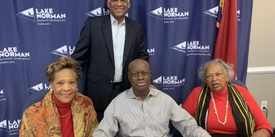 Dan Houston, standing, emceed the Lake Norman Chamber of Commerce diversity council's discussion with, from left, Ruby Houston, Ron Potts and Betty Caldwell.