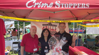 Tommy Davis, from left, historian for North Meck Crime Stoppers, Arlene Arciero, treasurer, and David Rochester, chairman, volunteer at an event. Crime Stoppers is a 
community-based program designed to assist local law enforcement agencies with crime prevention. 