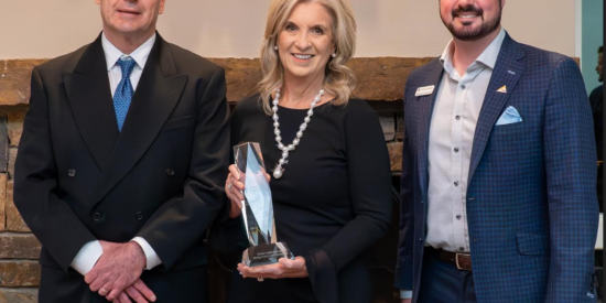 Scott T. Fletcher, manager of natural resources for Duke Energy presents Robin Smith Salzman of the Giving with Grace Foundation with the Duke Energy Citizenship and Service Award.  Also pictured is 2023 Chamber Chair Douglas Marion.  Photo: John McHugh/Ocaid Photography