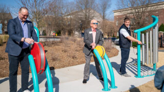 From left: Sean Herndon, North Mecklenburg Rotary Club; Mayor Woody Washam; Dale Gillmore, Make An Impact Foundation