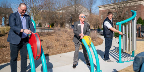 From left: Sean Herndon, North Mecklenburg Rotary Club; Mayor Woody Washam; Dale Gillmore, Make An Impact Foundation
