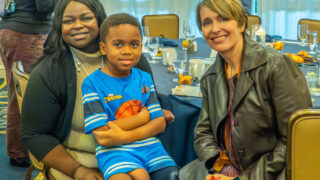 Tynsley Lockhardt-Williams, Board Member and mother of Niko, one of the first-year graduates of Cornelius Early Scholars with preschool director, Margy Nance. Photo by John McHugh – Ocaid Photography.