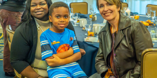 Tynsley Lockhardt-Williams, Board Member and mother of Niko, one of the first-year graduates of Cornelius Early Scholars with preschool director, Margy Nance. Photo by John McHugh – Ocaid Photography.